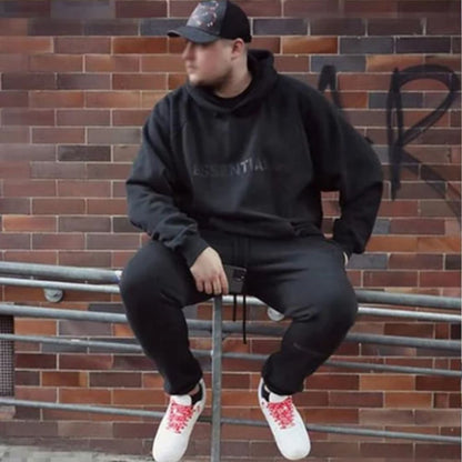 Essentials Hoodie - Black Oversized Long-Sleeve Pullover Unisex