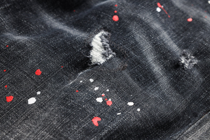 Paint splatter distressed jeans