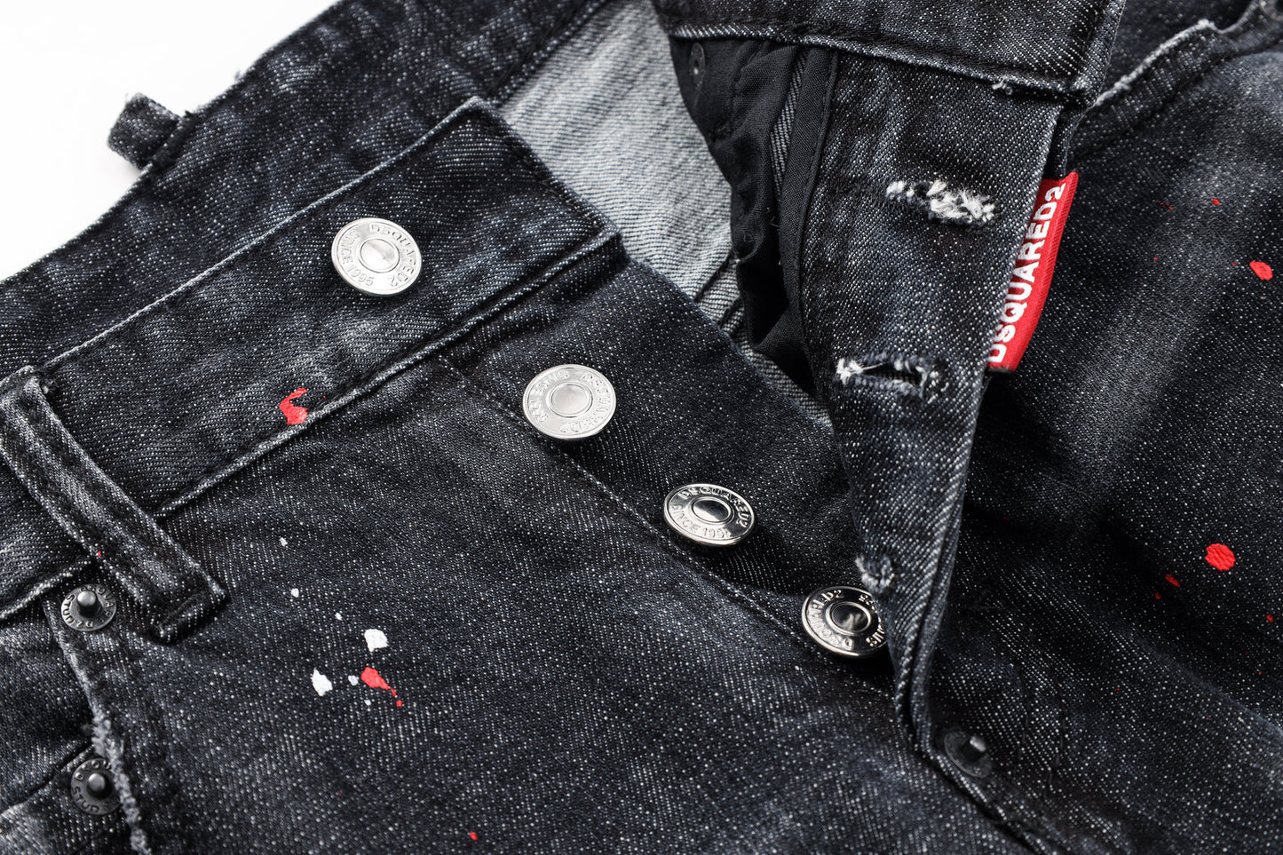 Paint splatter distressed jeans